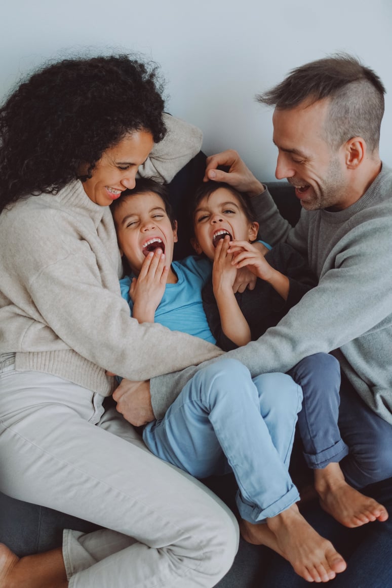 Family of Four Hanging Out Together